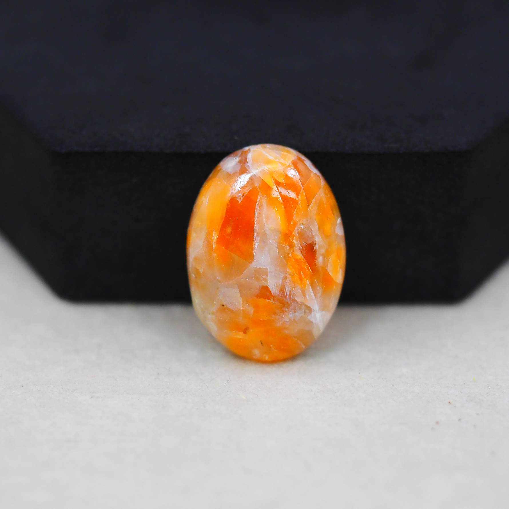 Natural Orange Calcite Oval Cabochon 23x17mm 16ct - warm honey-orange - Pedra Gems.