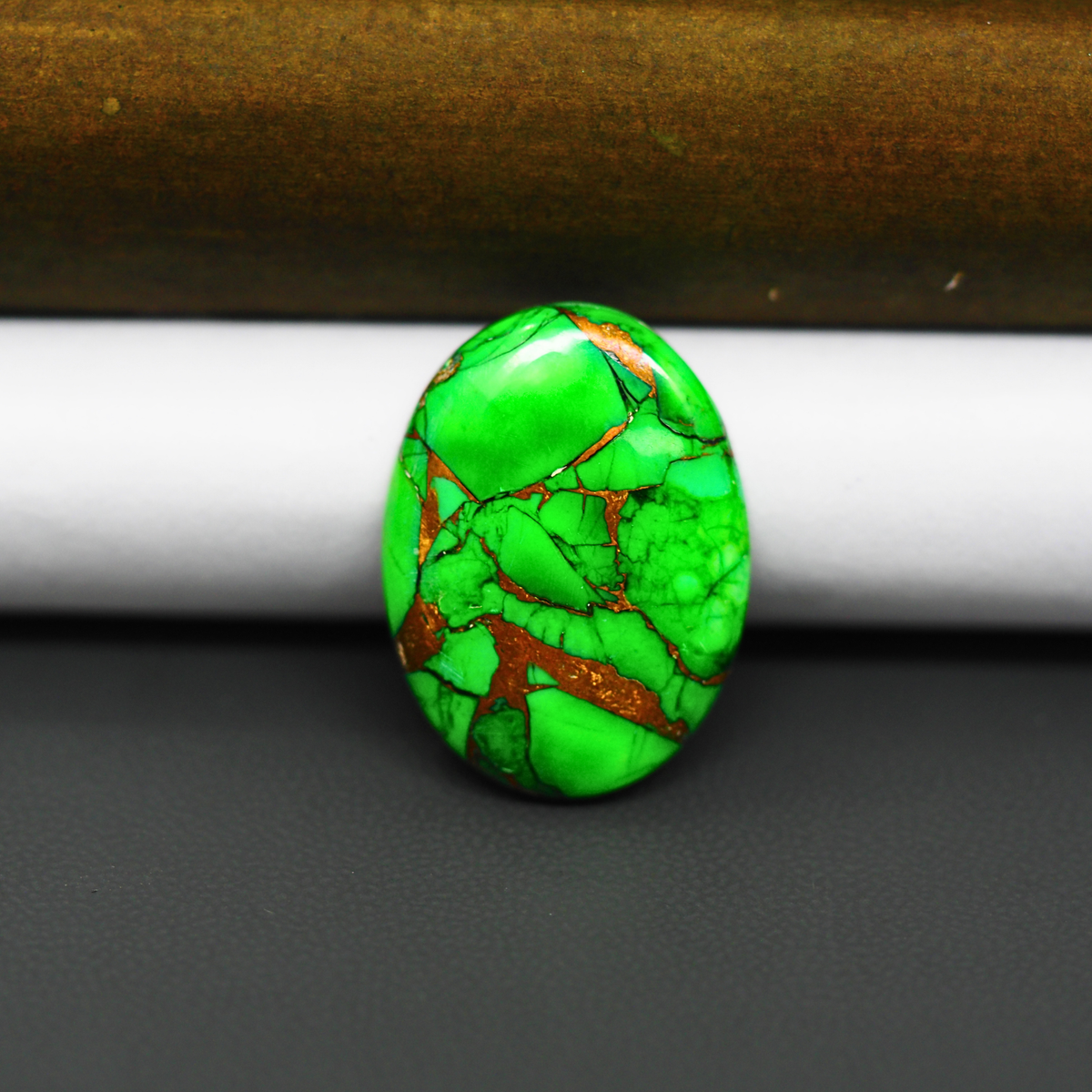 Natural Emerald Dahlia Oval Cabochon 24x16mm 17ct - vivid green with copper matrix, ships to Europe, Japan, Canada, Australia, NZ & worldwide - Pedra Gems.