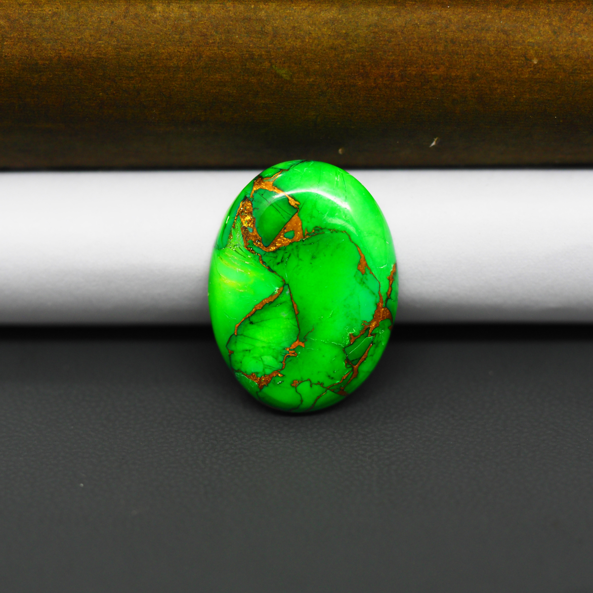 Natural Emerald Dahlia Oval Cabochon 23x18mm 13.5ct - vivid green with copper matrix, ships to Europe, Japan, Canada, Australia, NZ & worldwide - Pedra Gems.