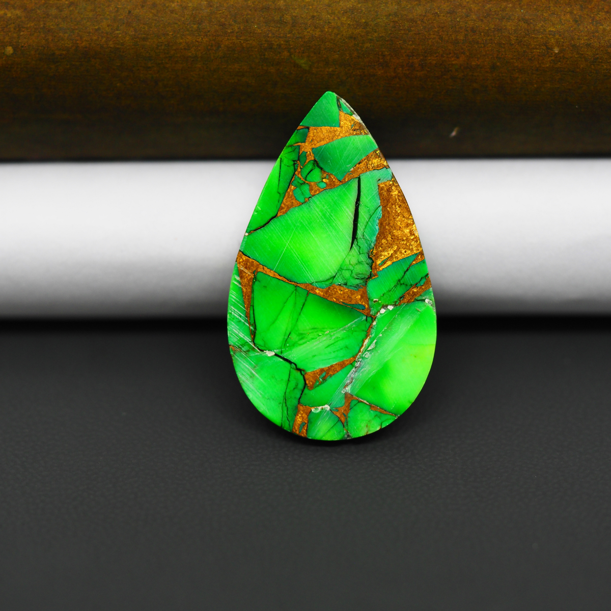 Natural Emerald Dahlia Pear Cabochon 32x19mm 23.5ct - vivid green with copper matrix, ships to Europe, Japan, Canada, Australia, NZ & worldwide - Pedra Gems.