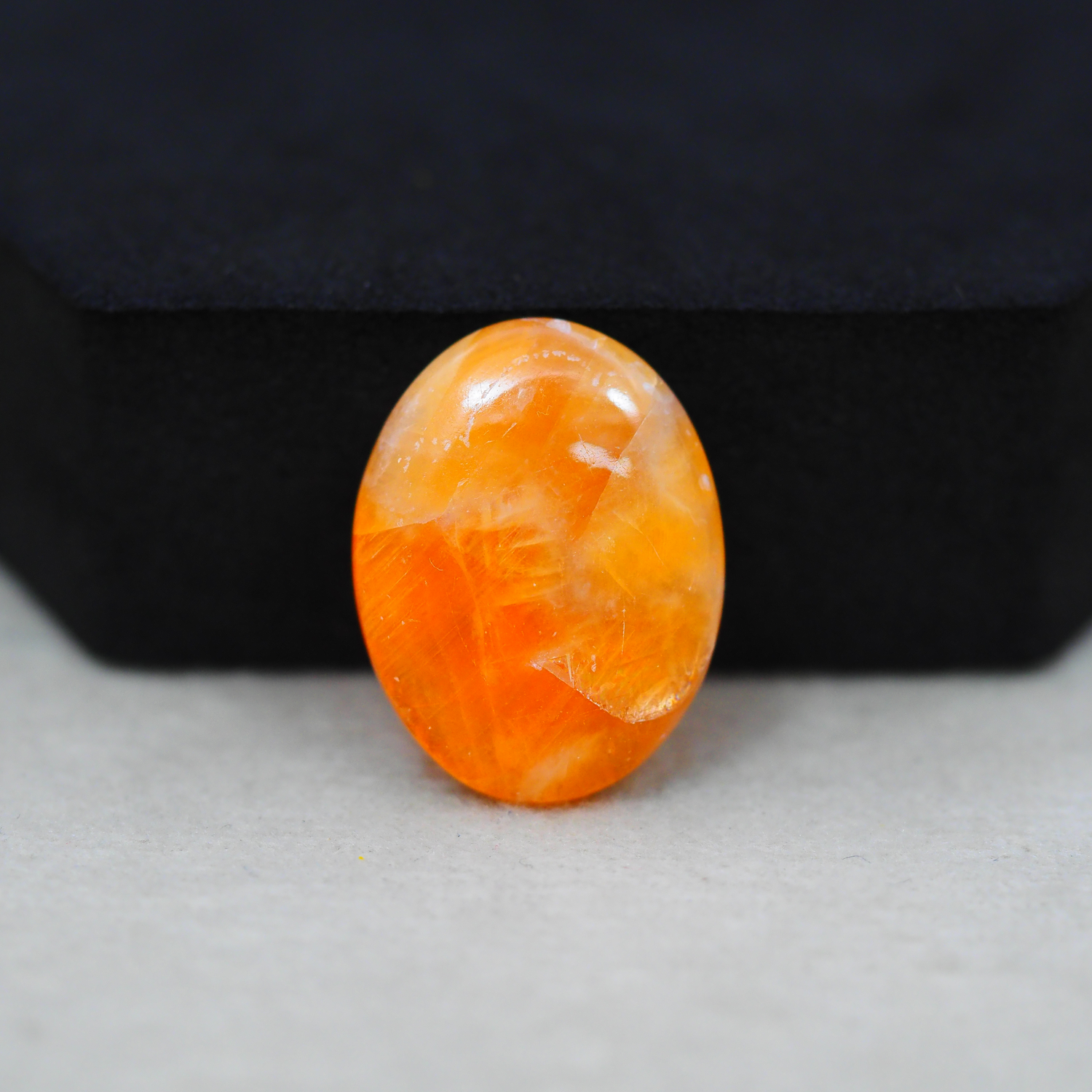 Natural Orange Calcite Oval Cabochon 22x17mm 14ct - warm honey-orange - Pedra Gems.