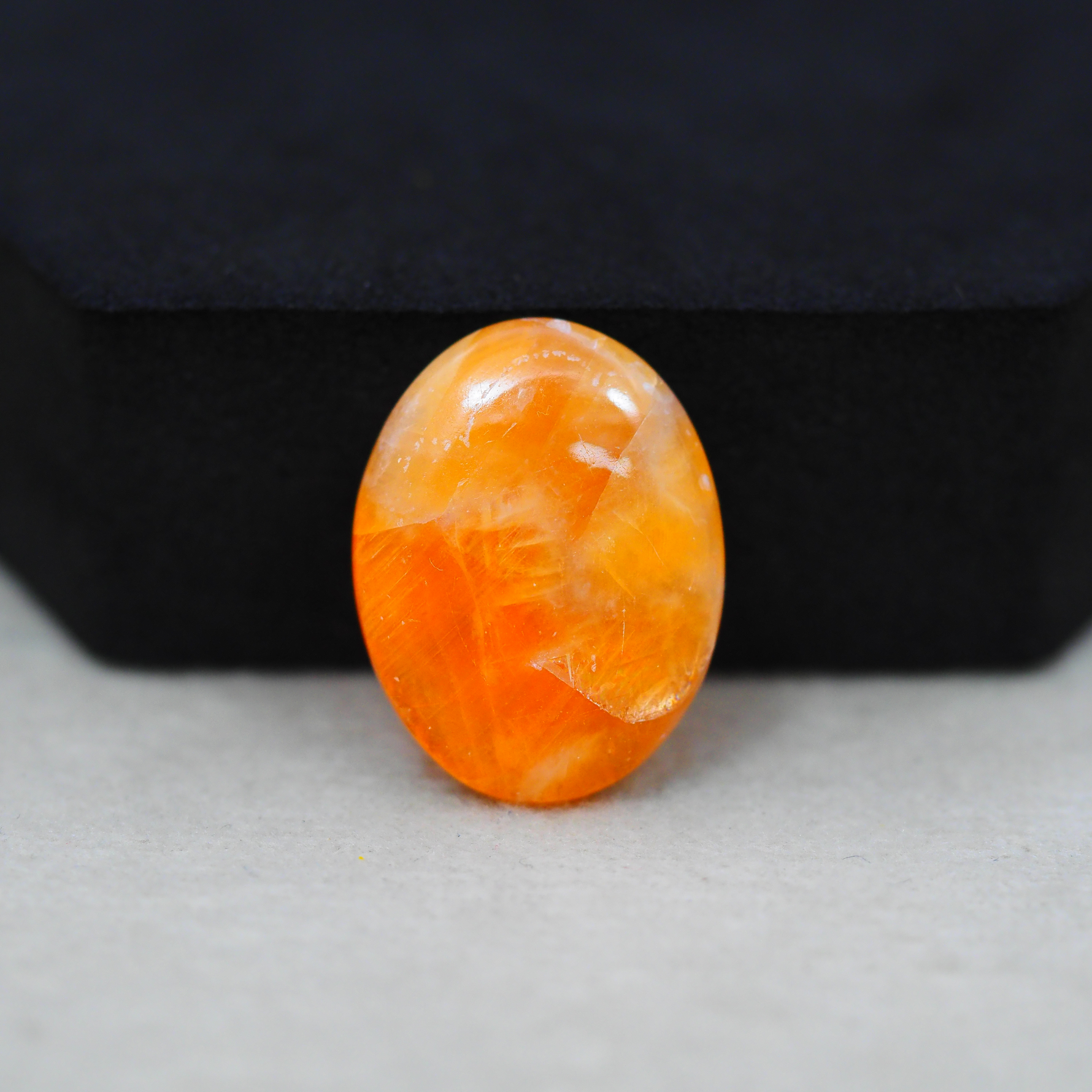 Natural Orange Calcite Oval Cabochon 22x17mm 14ct - warm honey-orange - Pedra Gems.