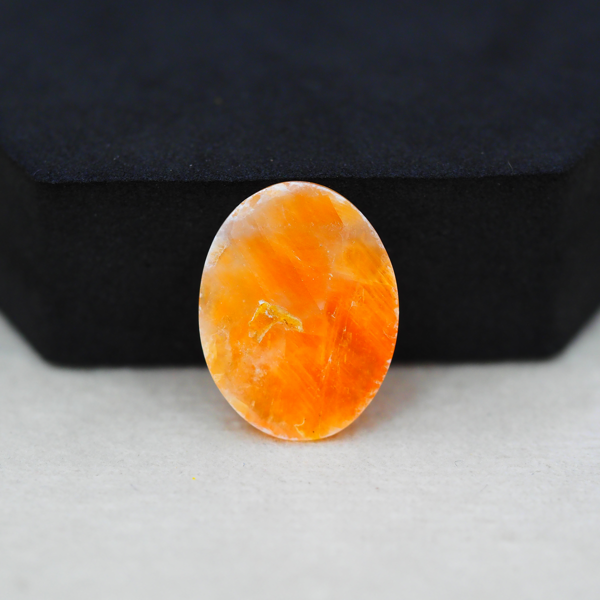Natural Orange Calcite Oval Cabochon 22x17mm 14ct - warm honey-orange - Pedra Gems.