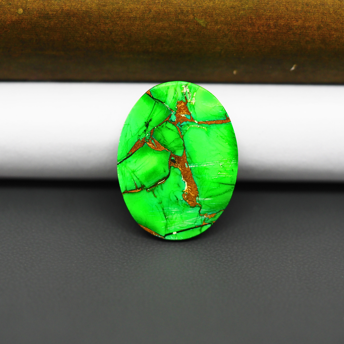 Natural Emerald Dahlia Oval Cabochon 24x18mm 15.5ct - vivid green with copper matrix, ships to Europe, Japan, Canada, Australia, NZ & worldwide - Pedra Gems.