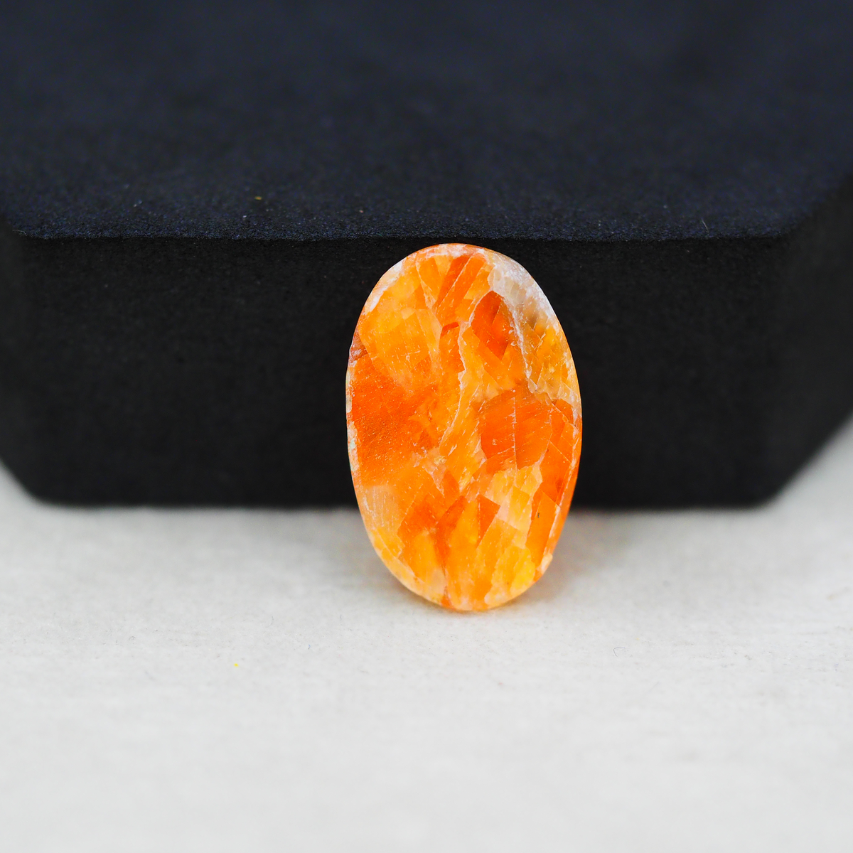 Natural Orange Calcite Oval Cabochon 22x14mm 11.5ct - warm honey-orange - Pedra Gems.
