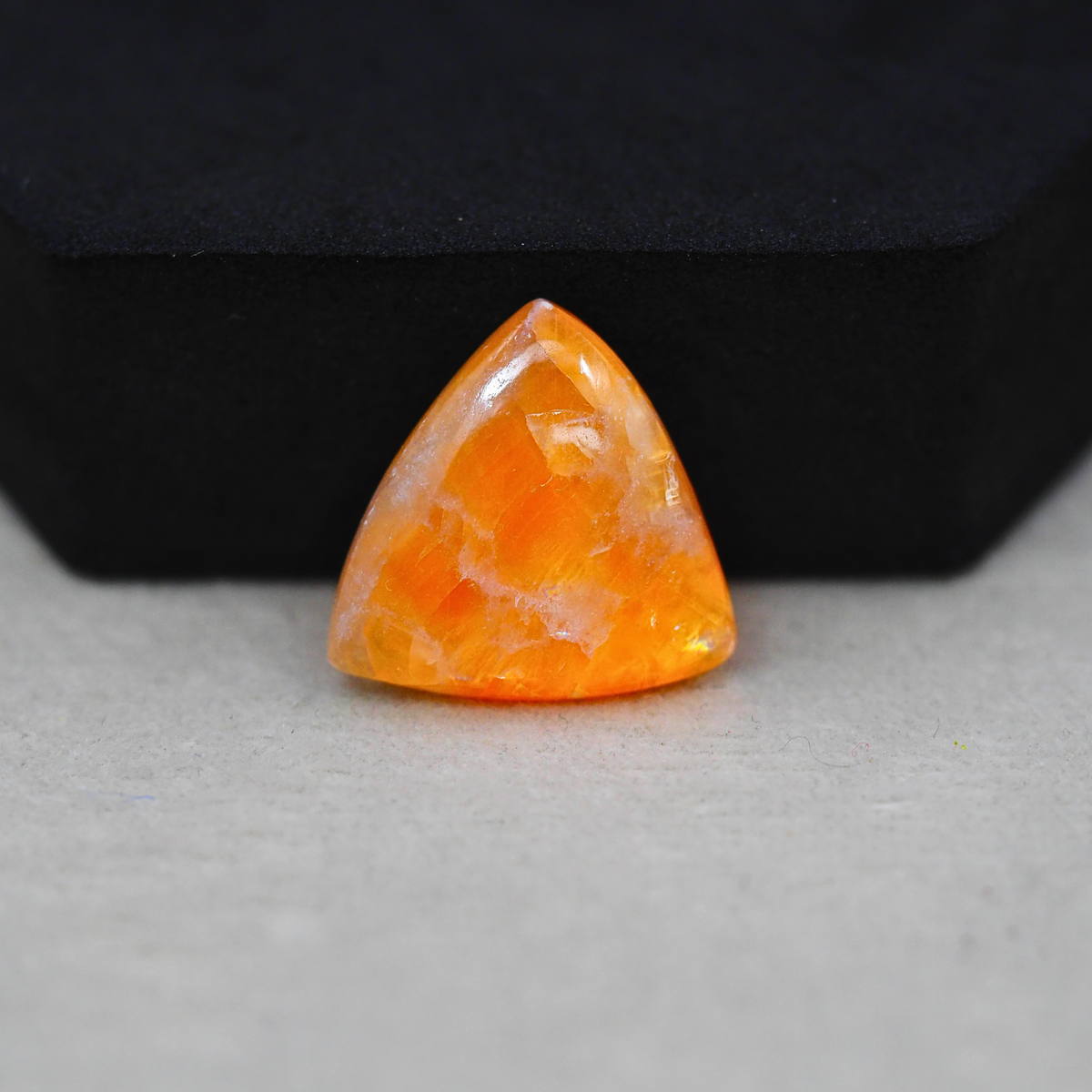 Natural Orange Calcite Trillion Cabochon 19x20mm 12.5ct - warm honey-orange - Pedra Gems.