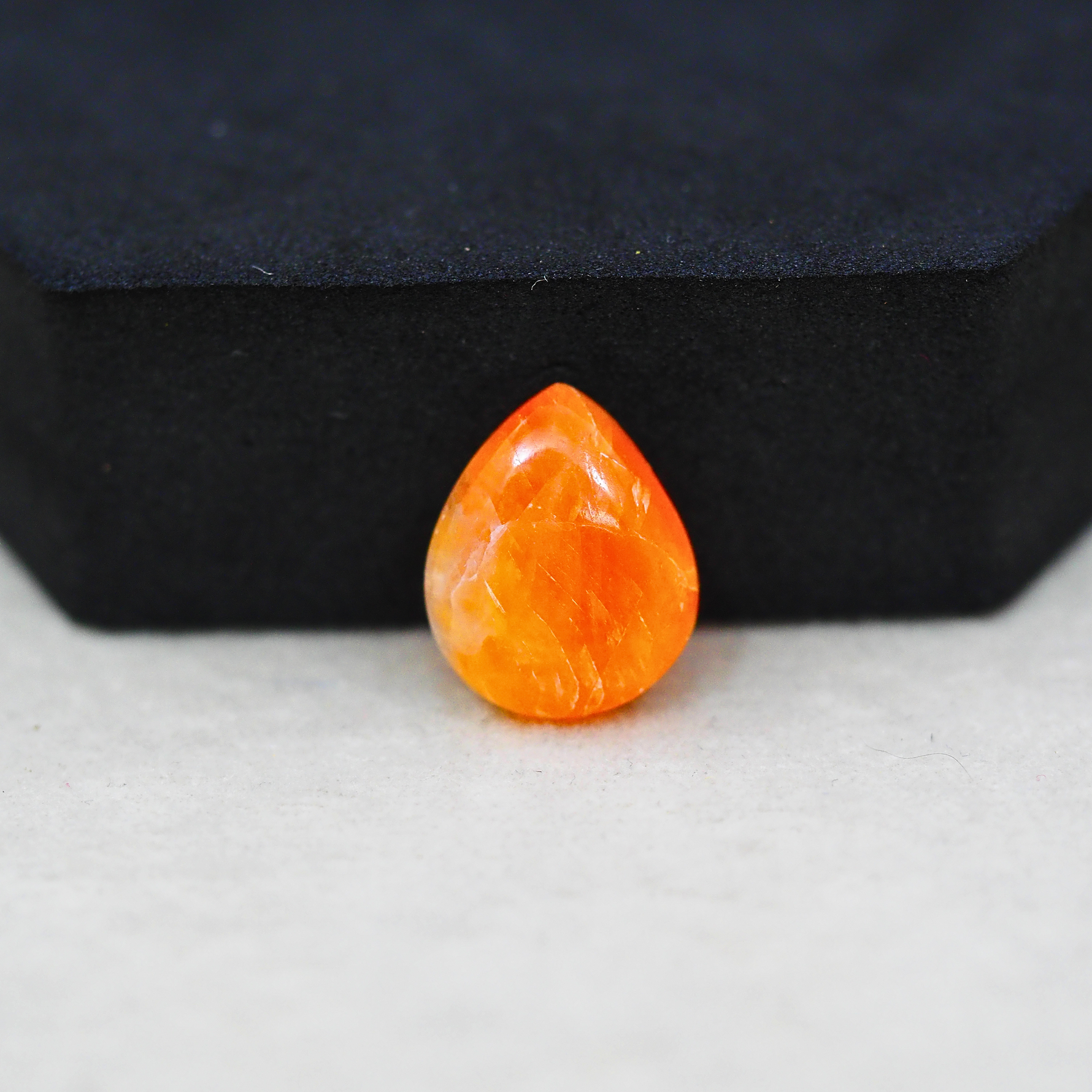 Natural Orange Calcite Pear Cabochon 16x13mm 7.5ct - warm honey-orange - Pedra Gems.