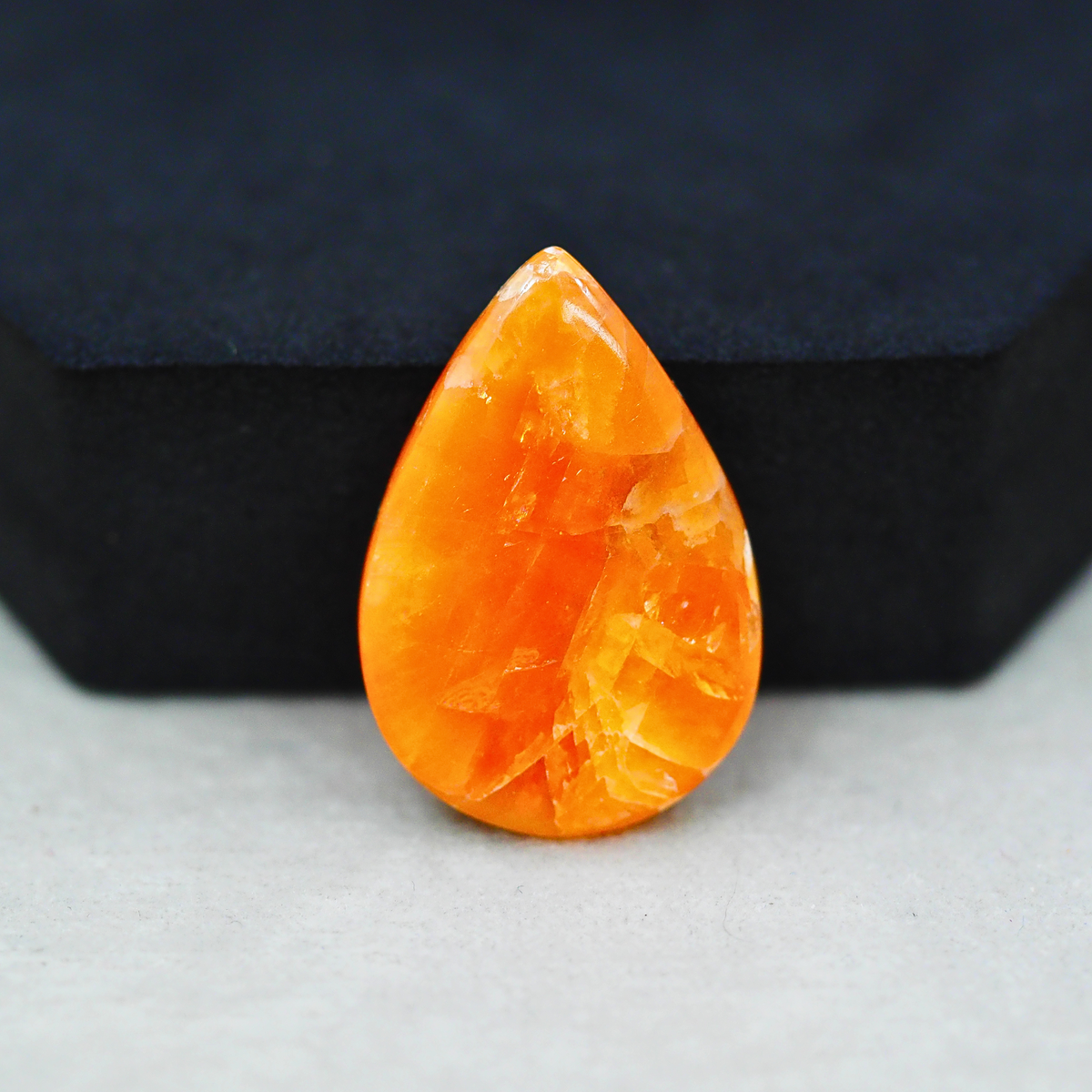 Natural Orange Calcite Pear Cabochon 29x20mm 21ct - warm honey-orange - Pedra Gems.