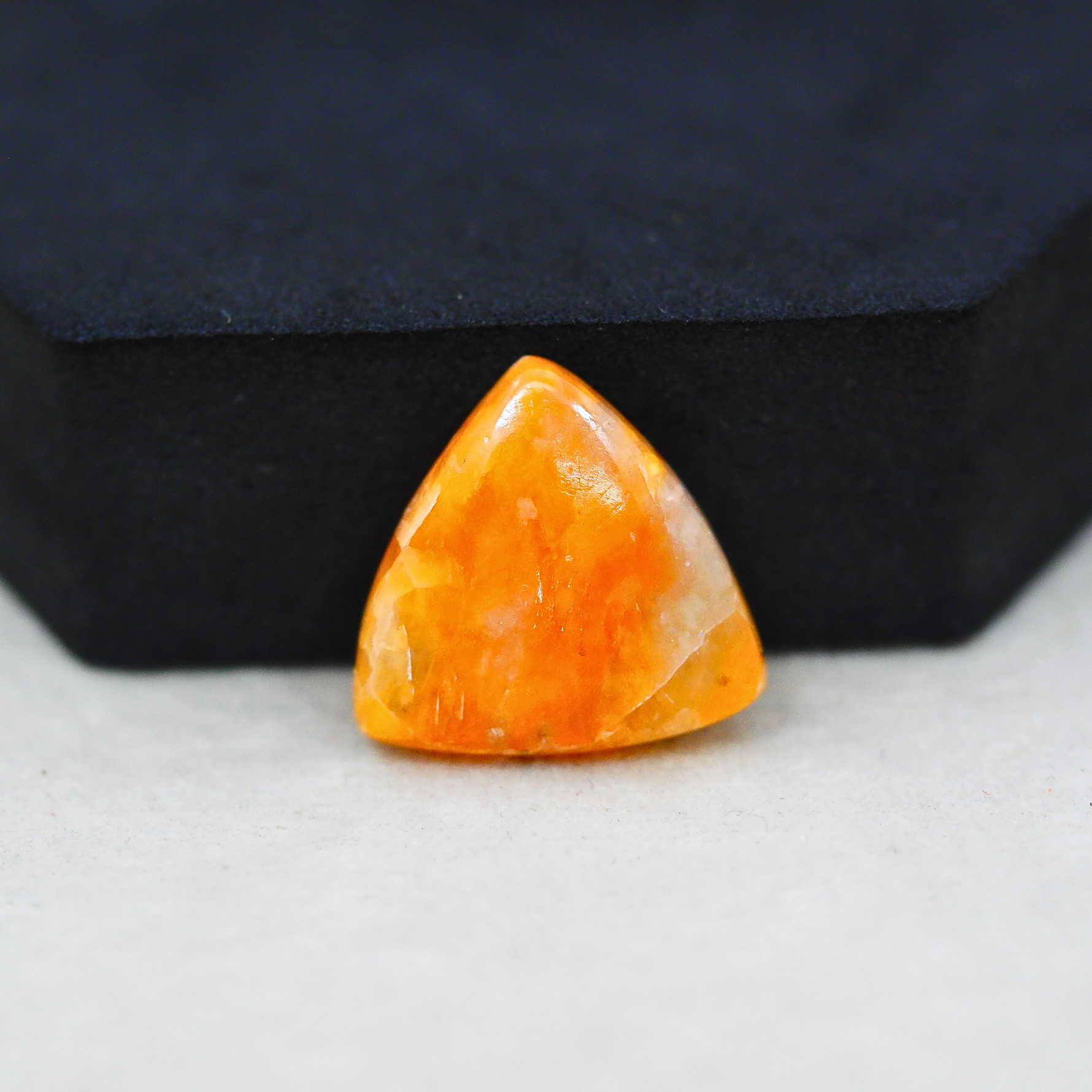 Natural Orange Calcite Trillion Cabochon 20x21mm 15ct - warm honey-orange - Pedra Gems.