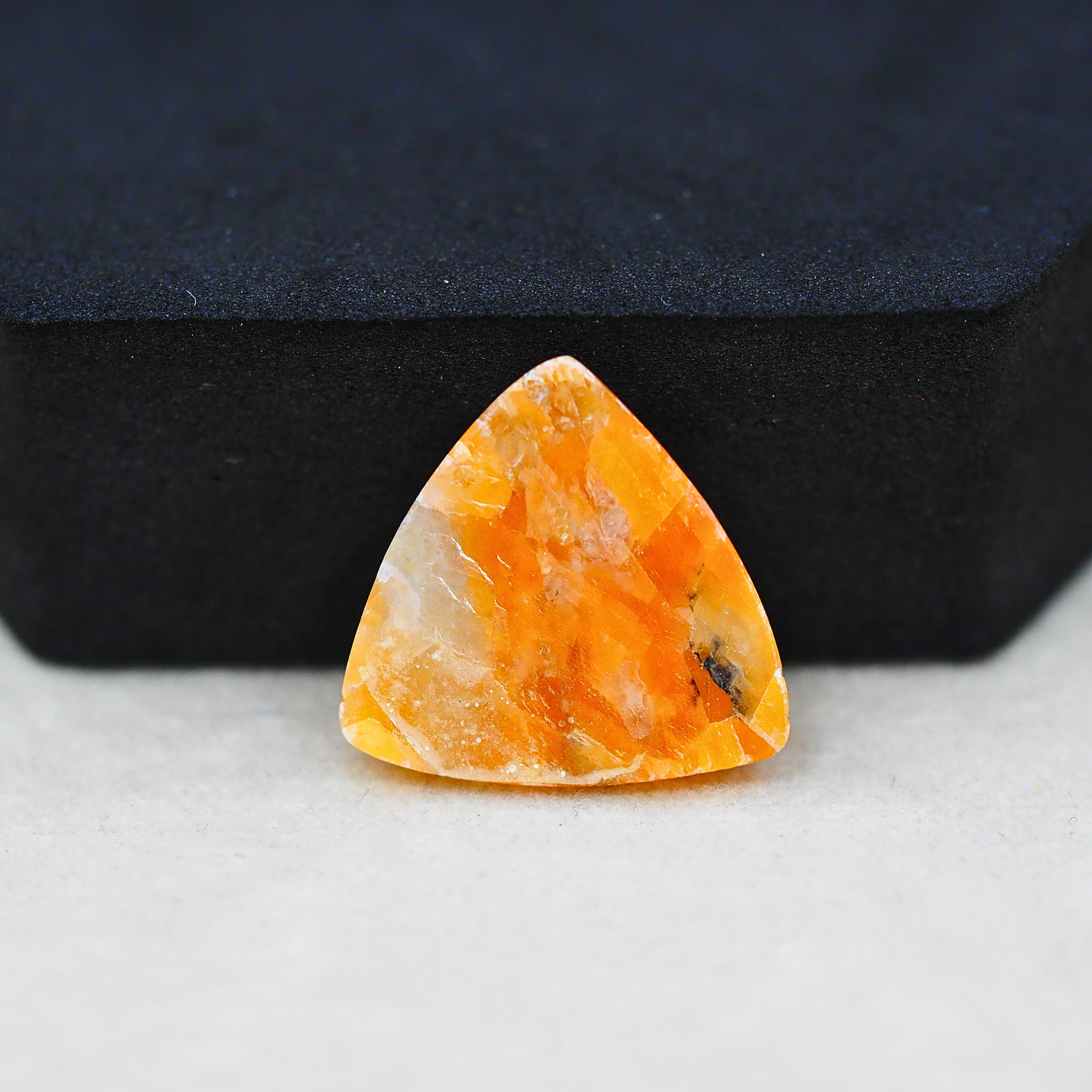 Natural Orange Calcite Trillion Cabochon 20x21mm 15ct - warm honey-orange - Pedra Gems.