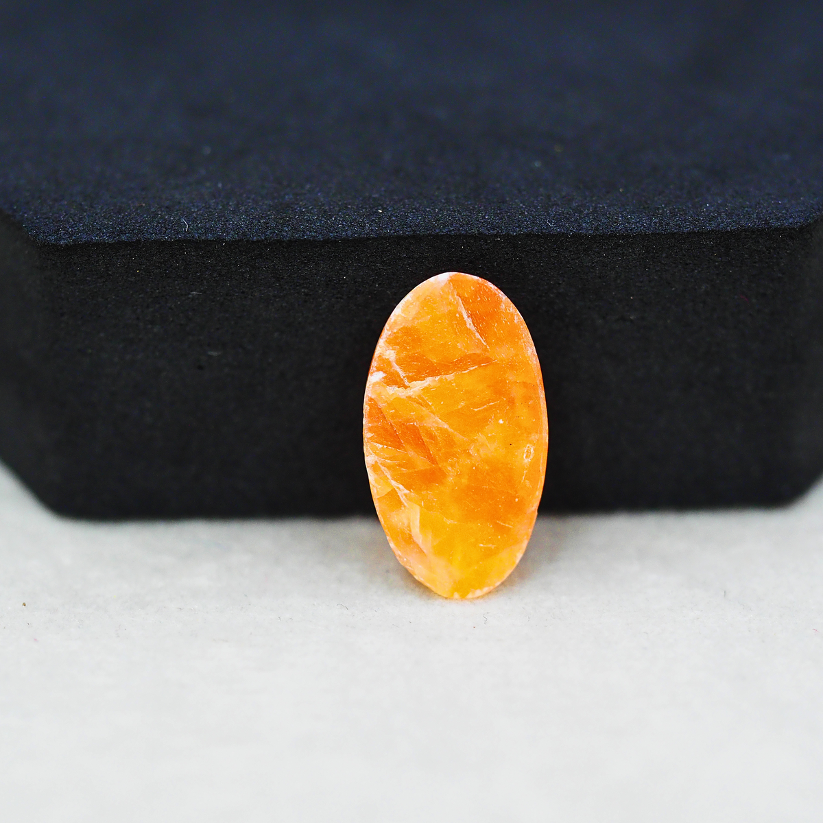 Natural Orange Calcite Oval Cabochon 19x11mm 6.5ct - warm honey-orange - Pedra Gems.